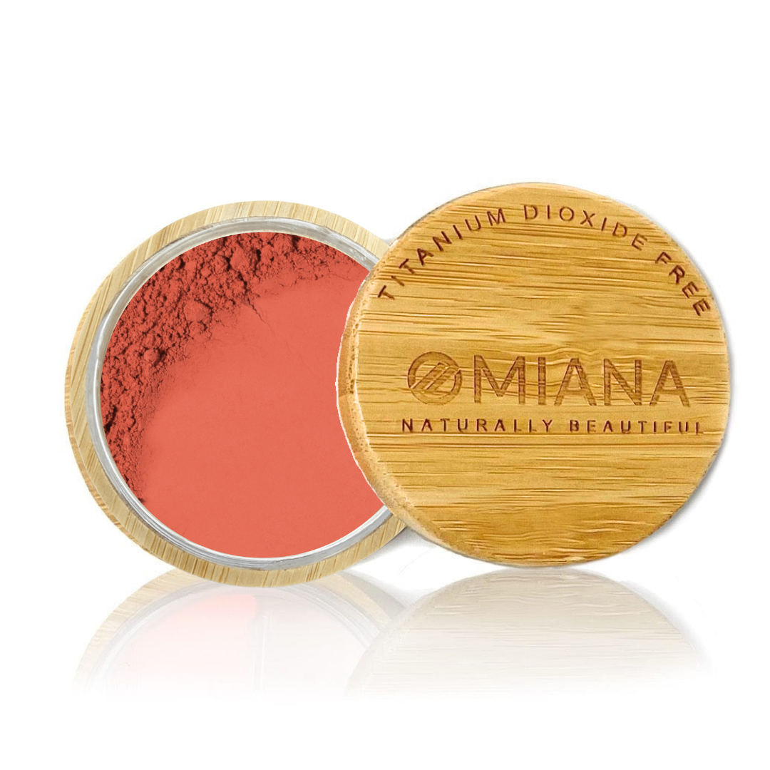 Omiana Loose Powder Mineral Blush Makeup in a bamboo container on a white background